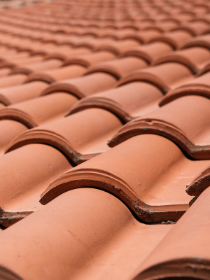 closeup photo a barrel roofing tiles