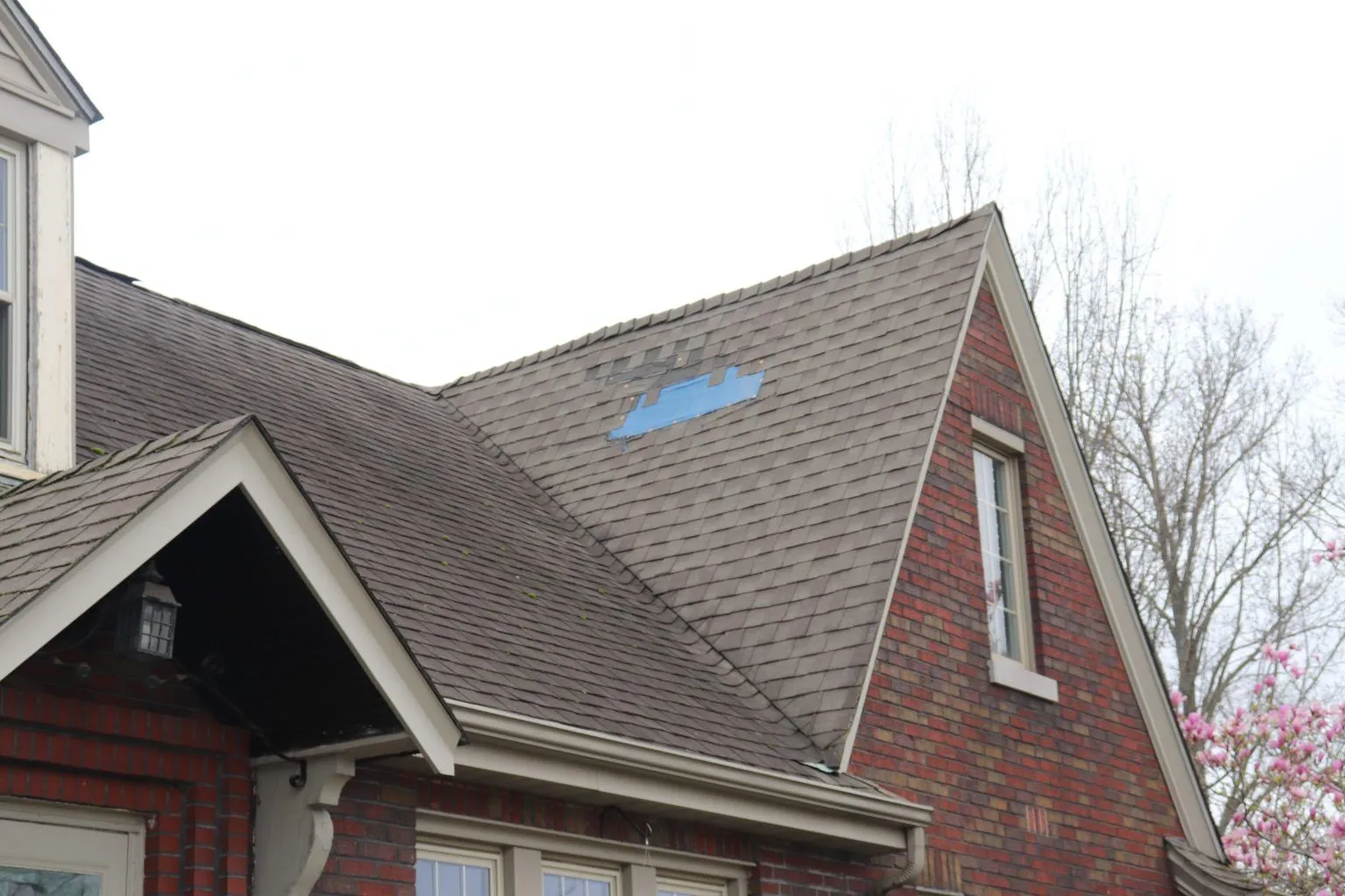 Elite Construction Solutions team completing a high-quality roof installation in St. Louis.